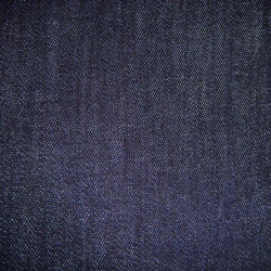 Zoom sur le tissu denim de la veste de cuisine NERO Jean Denim